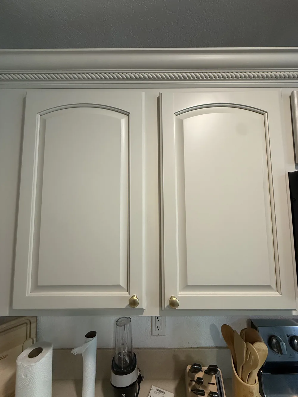 Close up of refinished upper cabinet doors