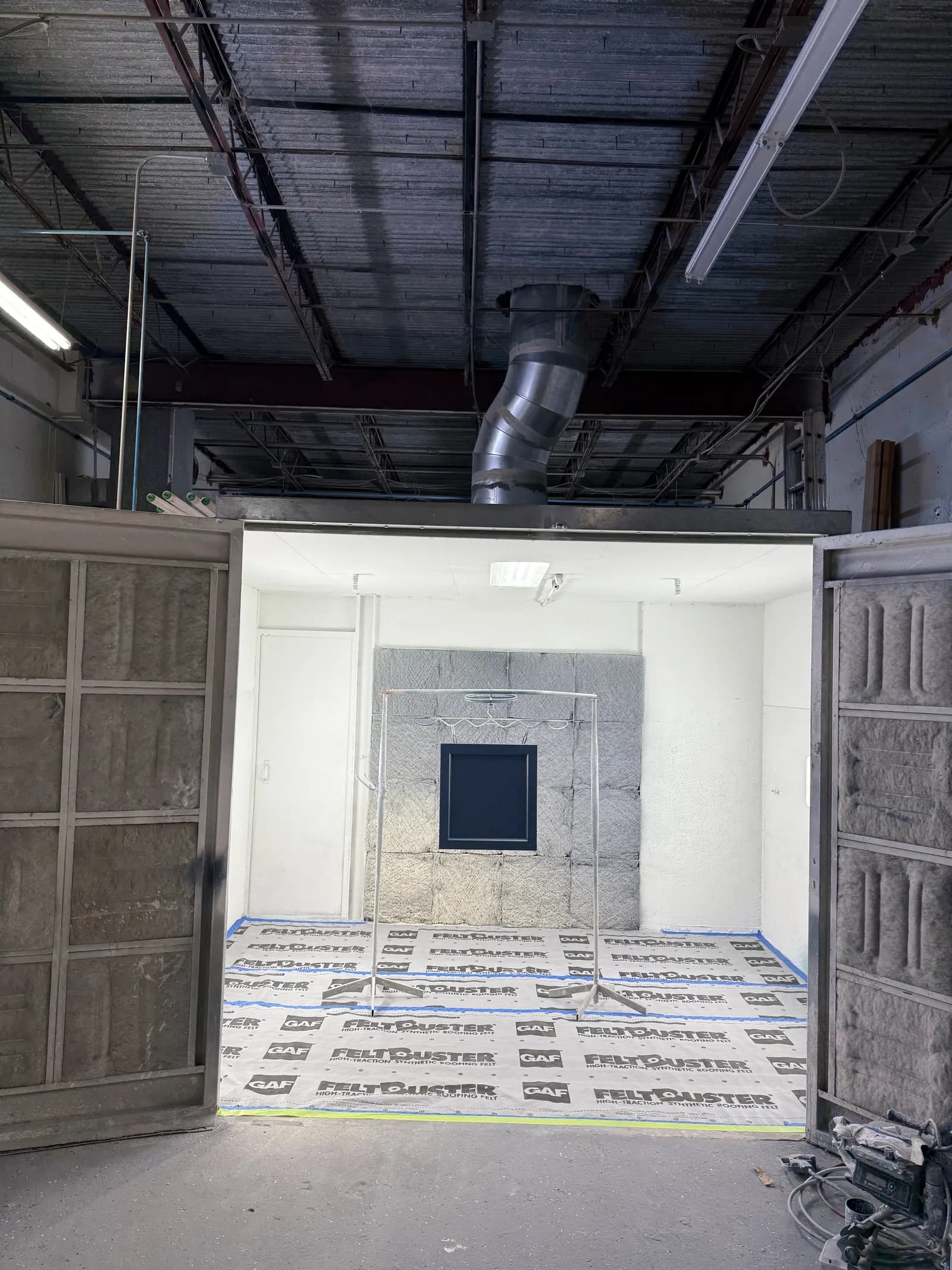 Inside the Paint On Painting finishing shop